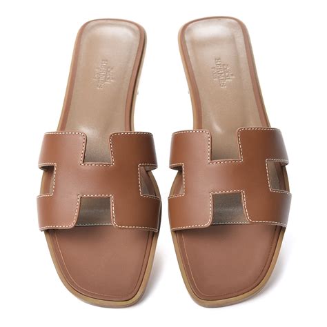 sandalias hermes|Hermes oran sandals in gold.